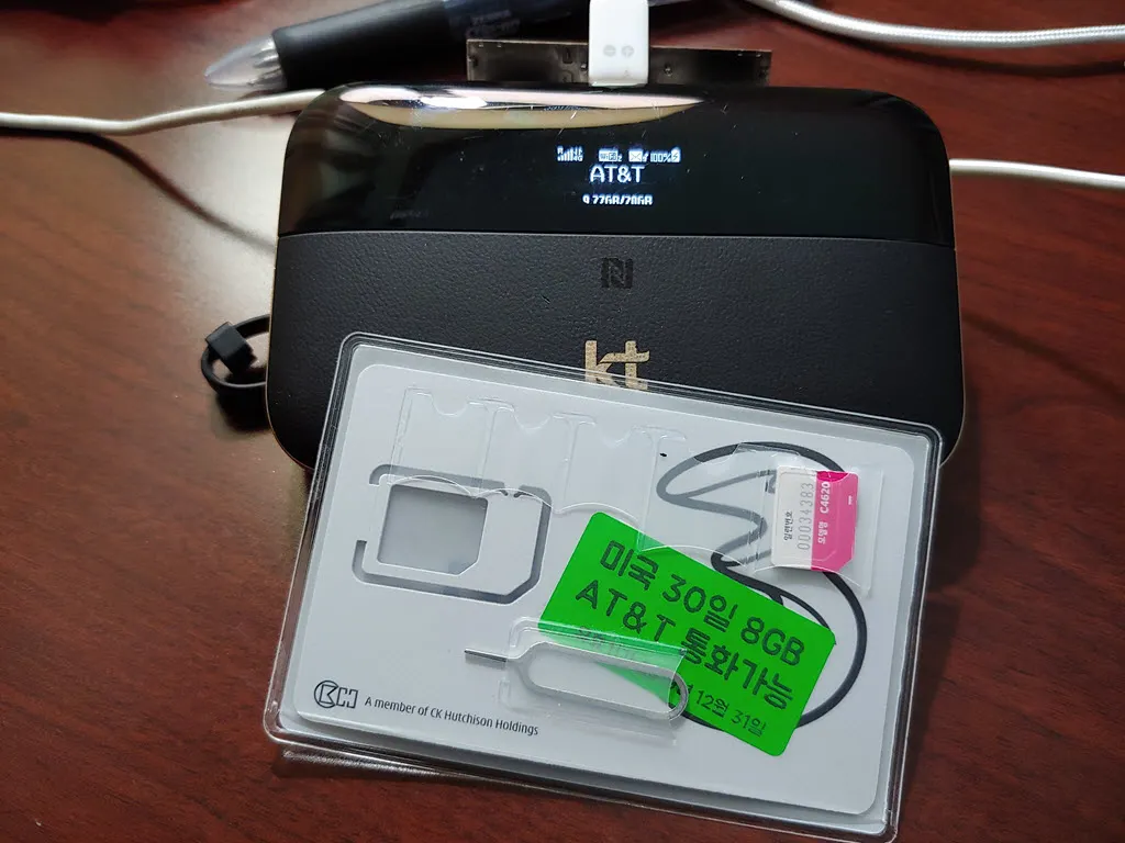 E5885의 AT&T망 접속된 화면과 나무커머스의 USIM